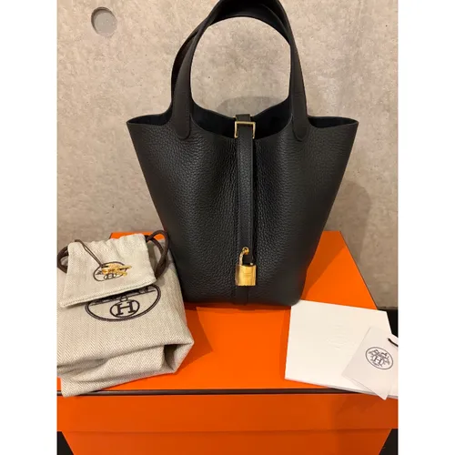 PM トリヨンクレマンス ノワール ゴールド金具