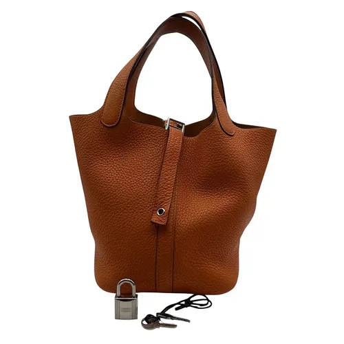 PM トリヨンクレマンス オレンジ シルバー金具