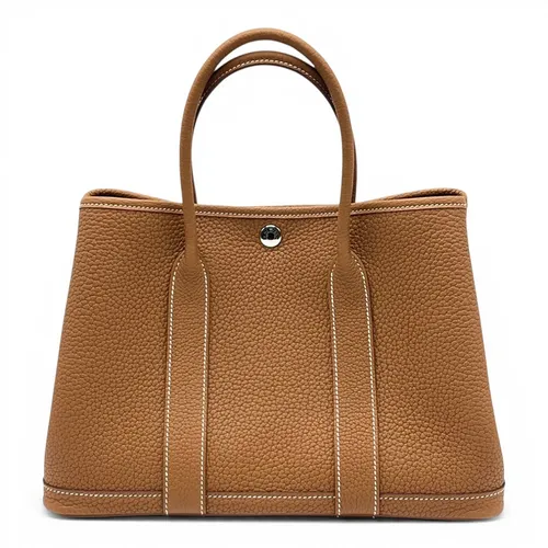 TPM ネゴンダ ゴールド シルバー金具